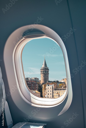 Aerial panorama of the city of Istanbul with Galata Tower, which opens from the window of the plane during the flight.