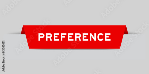 Red color inserted label with word preference on gray background