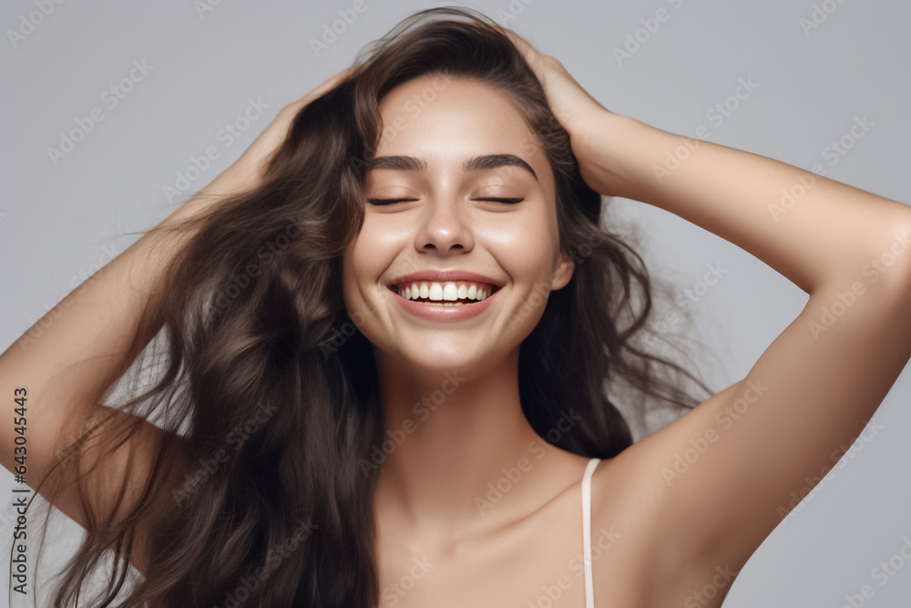 Charming Asian teenager with wavy long hair blowing in the breeze exudes positivity with a bright smile on a solid background. Generative AI. Charming Asian teenager with wavy long hair blowing in the breeze exudes positivity with a bright smile on a solid background. Generative AI.