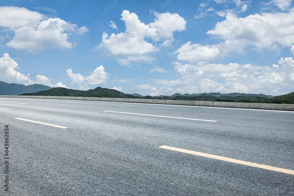 Empty asphalt road and mountain nature scenery in Guilin, China