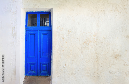 Old wooden door in a Greek village © Rawf8