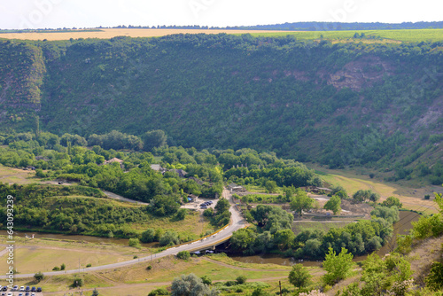 View of the valley between the hills in Old Orhei archaeological park, Trebujeni commune, Moldova photo