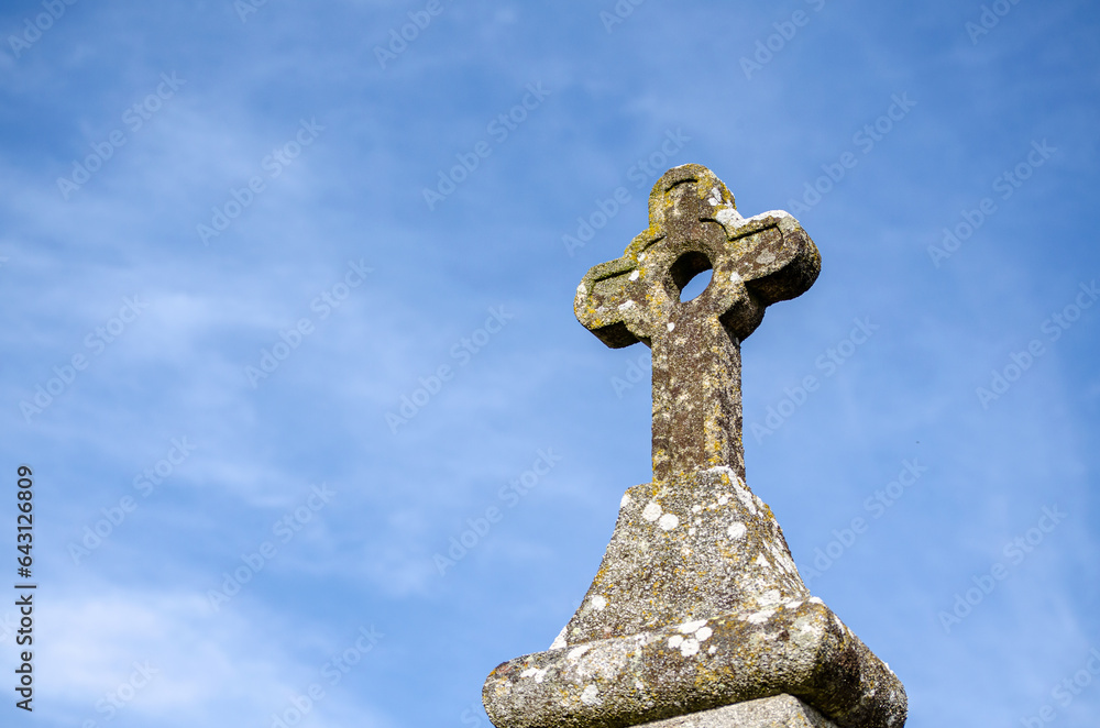 Granite stone cross in a graveyard in Galicia, Spain.