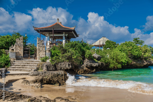 Fototapeta Naklejka Na Ścianę i Meble -  Tropical beach with hinduism temple in Nusa Dua.