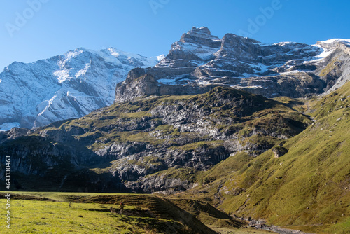 Switzerland Mountain valley Kiental, Berner Oberland Alps. Snow mountains, sunny weather, travel to Swiss. photo