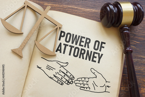 Power of attorney is shown using the text and photo of gavel