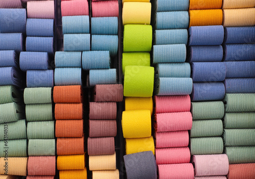Close up view on samples of cloth and fabrics in different colors.