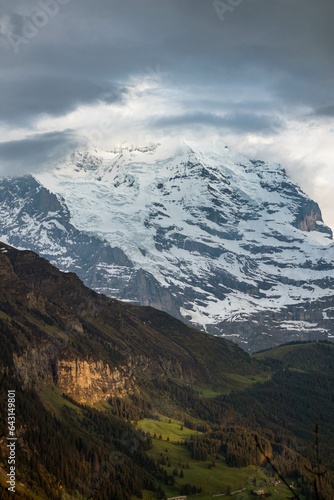 Close Up Views of Snow Covered Mountains in The Swiss Alps with Mountains in the background in Switzerland in Summer