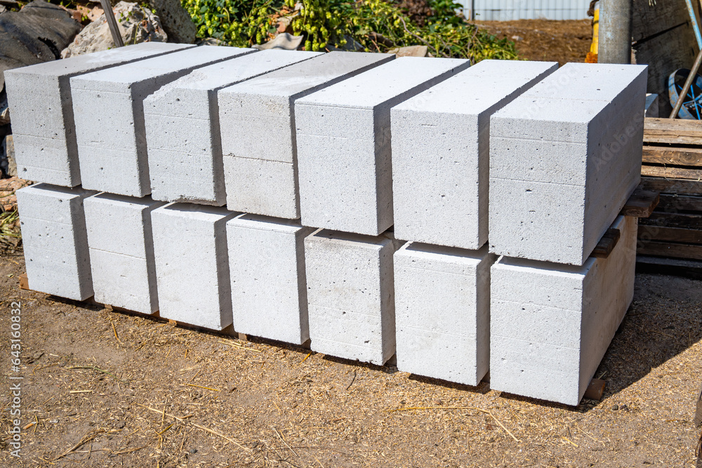 Storage of aerated concrete blocks closeup. Laying aerated concrete blocks. Construction of
