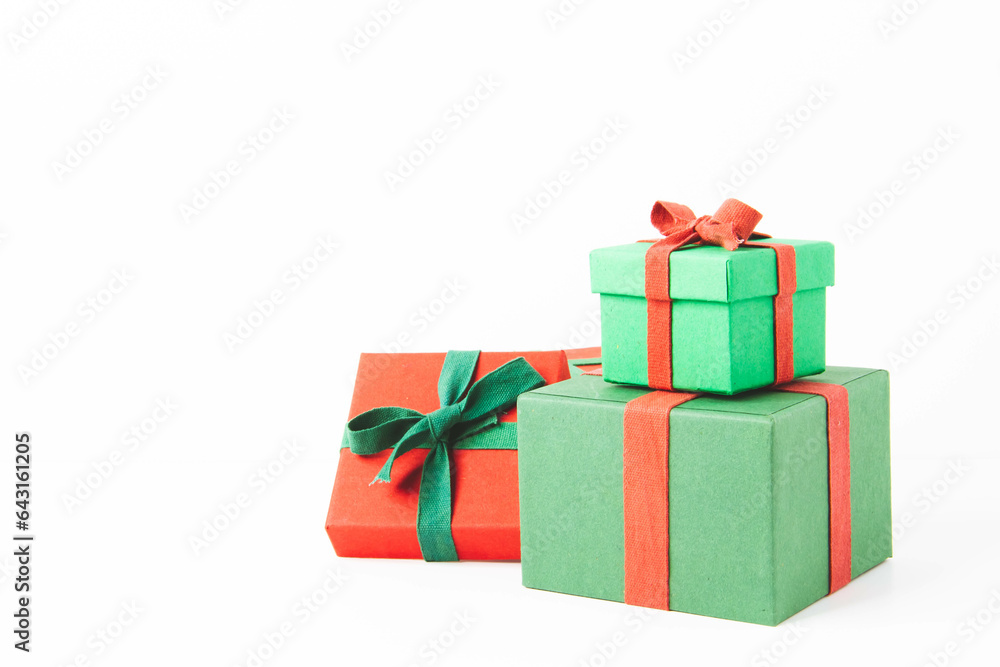 Obraz premium Present. Gift box with a bow. New Year's surprise. Red and green box with a gift