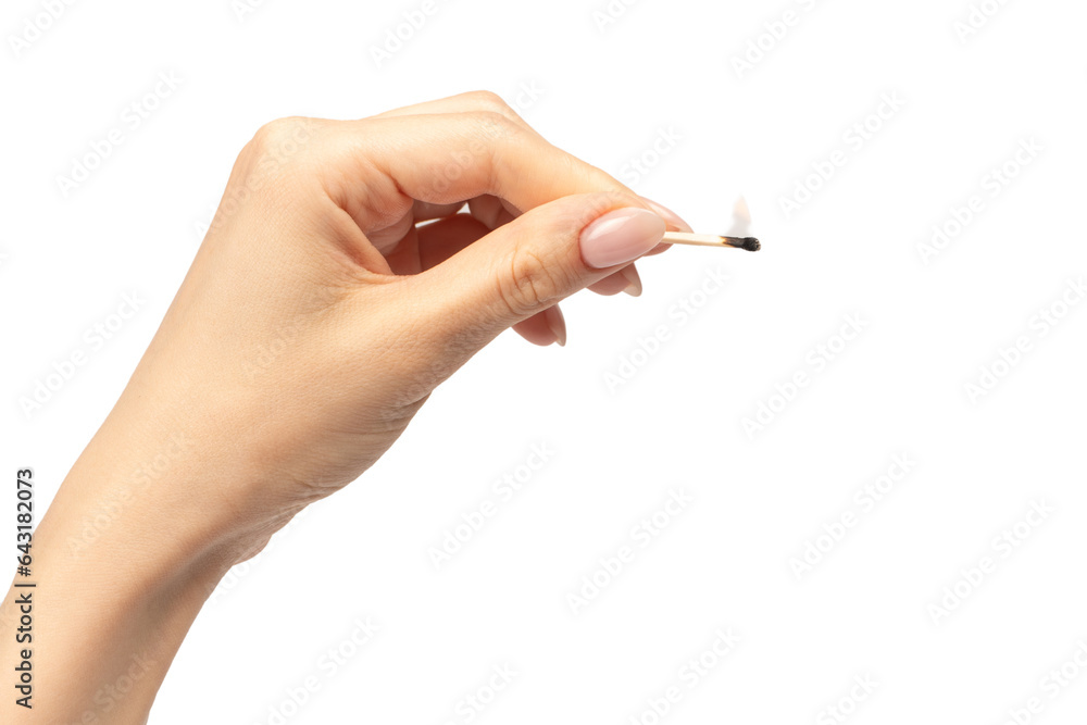 Lit match in a woman hand isolated on a white background. Lit match in a woman hand isolated on a white background.