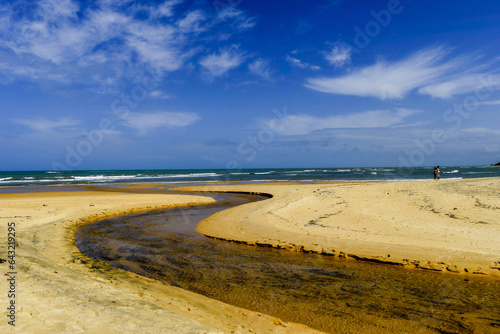 Rio que se encontra com o mar na praia dos espelhos que é um apelido devido ao efeito causado pelo reflexo do sol nas piscinas naturais quando avistadas do mar no povoado de Caraíva, Bahia - 110 photo