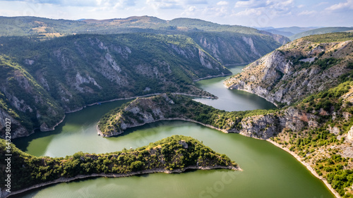 Aerial view to viewpoint Vidikovac Molitva, with curved meanders in canyon of Uvac river, Serbia photo