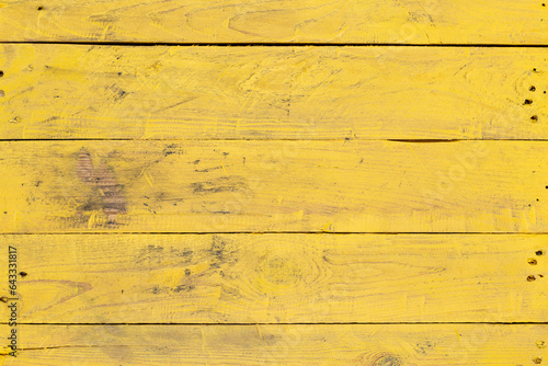 Wallpaper Mural Weathered yellow wood texture background. Yellow stained wooden billboard close-up. Horizontal direction boards. Wavy pattern of wood fibers. Torontodigital.ca