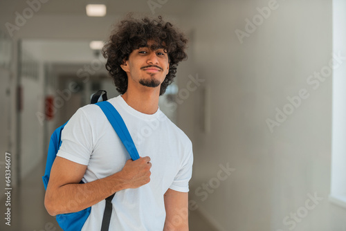 Portrait of a male college student on a university campus.