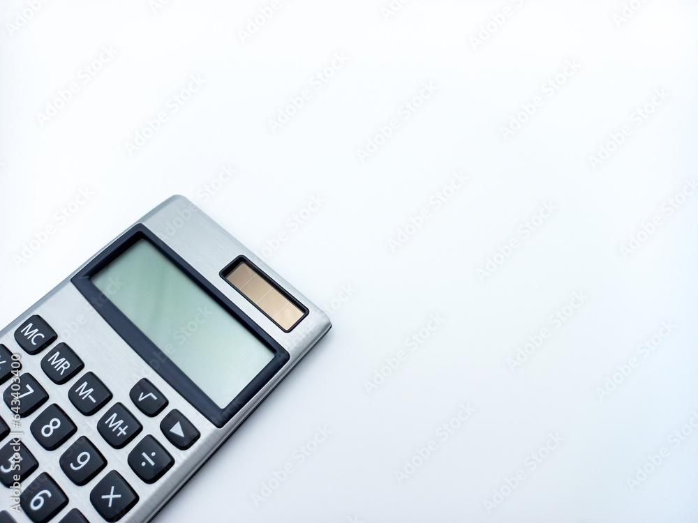 Digital Pocket Calculator isolated On White Background. Corner Position With Negative Space Digital Pocket Calculator isolated On White Background. Corner Position With Negative Space