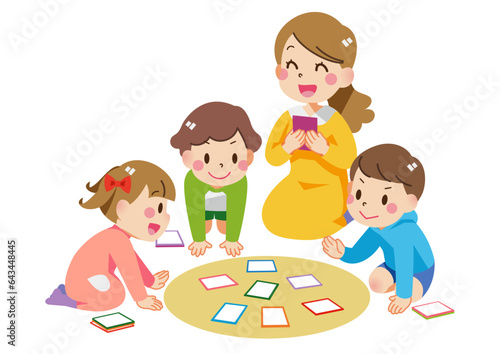 カルタで遊ぶ子供たち