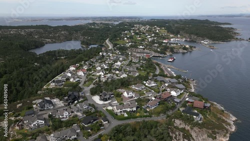 Drone Flyover of Rich Neighborhood on the West Coast of Norway near Bergen. Close to Vikavågen in Øygarden Municipality. Aerial drone footage photo