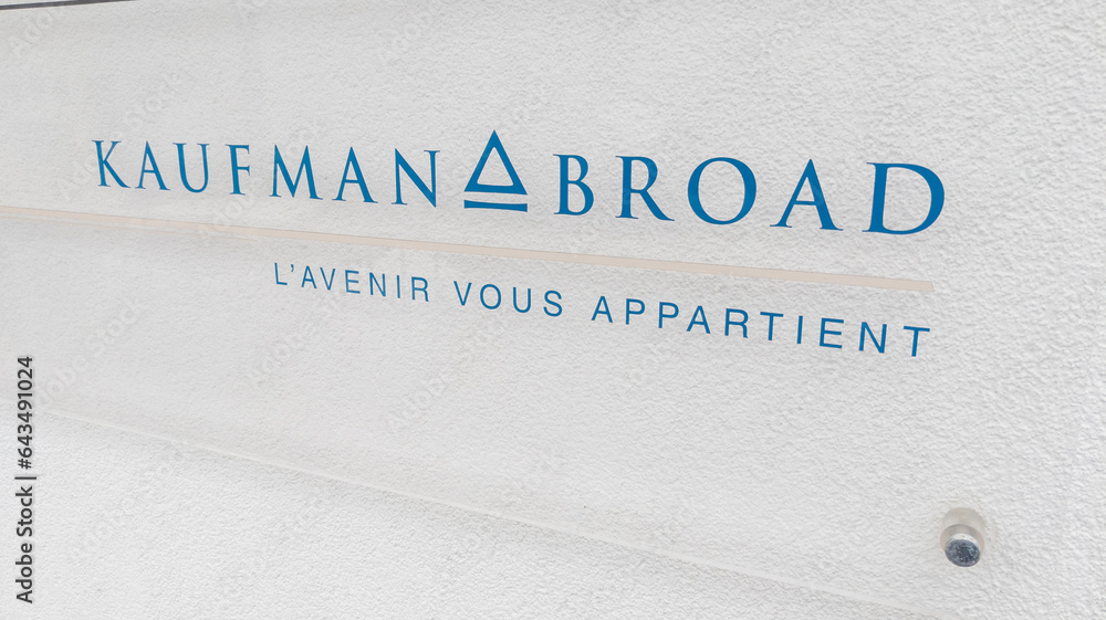 Kaufman & Broad office sign brand and text logo of real estate