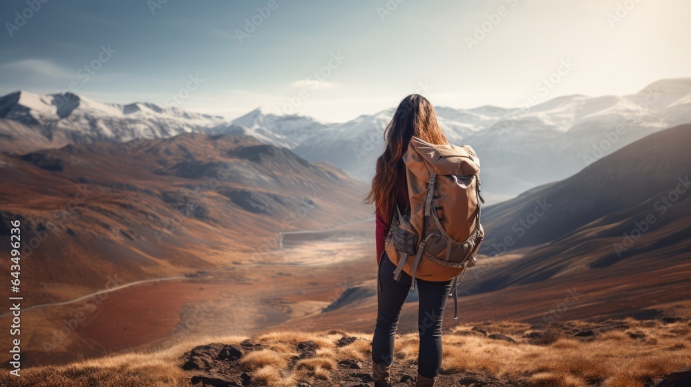 young backpacker in the mountains