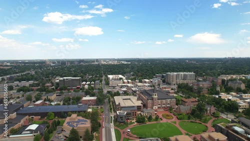 Drone flying low to historic university building at the University of Denver college campus in Denver, Colorado, USA photo