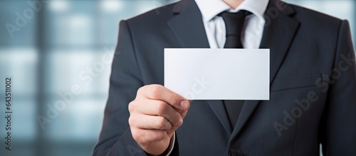 Businessman holding empty c...