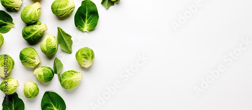 Close up top down view of green vegetables on a bright table background healthy food concept