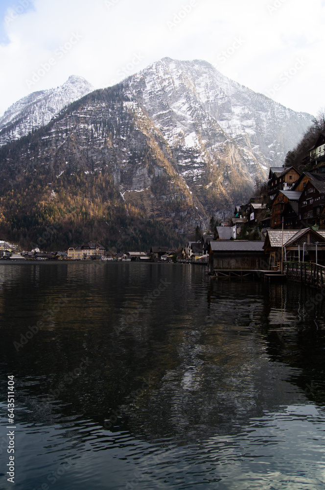 Hallstatt town in Austria surrounded by Alps. Vilage in mountains.