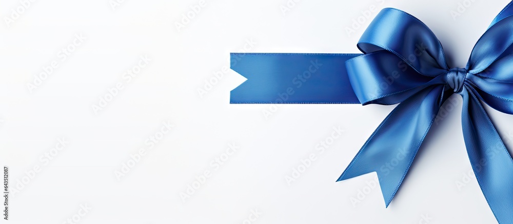 Packaging composition with traditional blue ribbon bow on white background Packaging composition with traditional blue ribbon bow on white background
