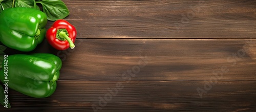 Green pepper on wood