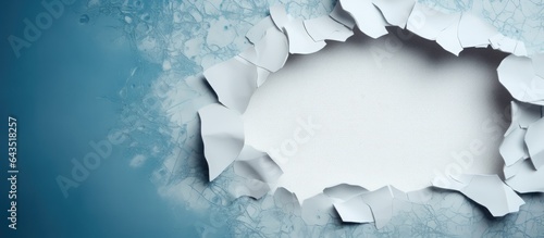 Damaged paper with hole and...