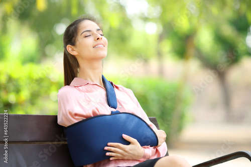 Fotografie Happy disabled woman breathing in a park