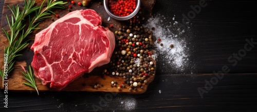 Marbled raw Ribeye steak wi...