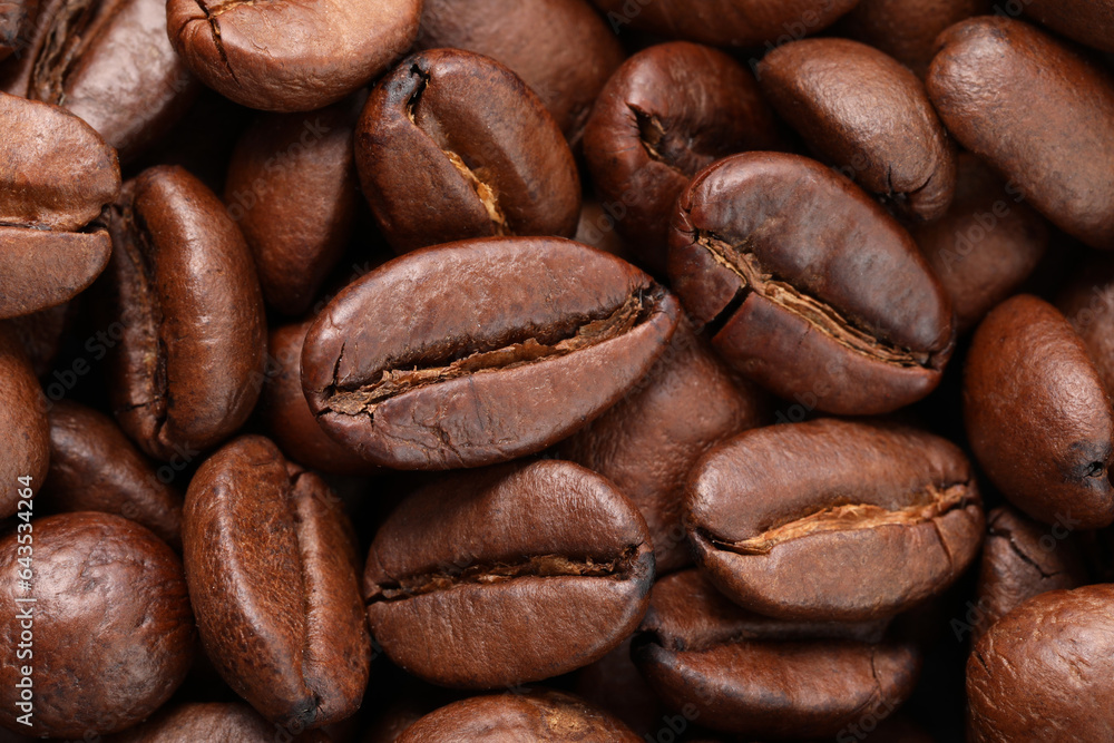 Obraz premium Aromatic roasted coffee beans as background, top view