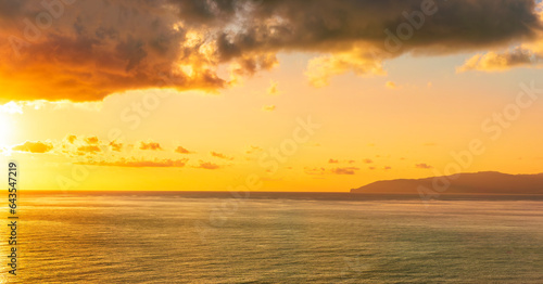 scenic landscape of colorful sunset or sunrise above water  evening or morning seascape