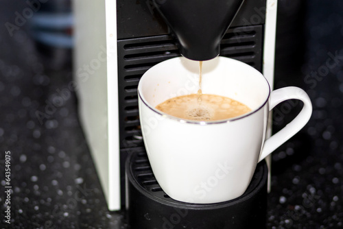 Close-up of coffee machine making hot coffee