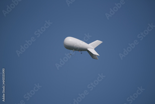 AIRSHIP - Flying object against the blue sky