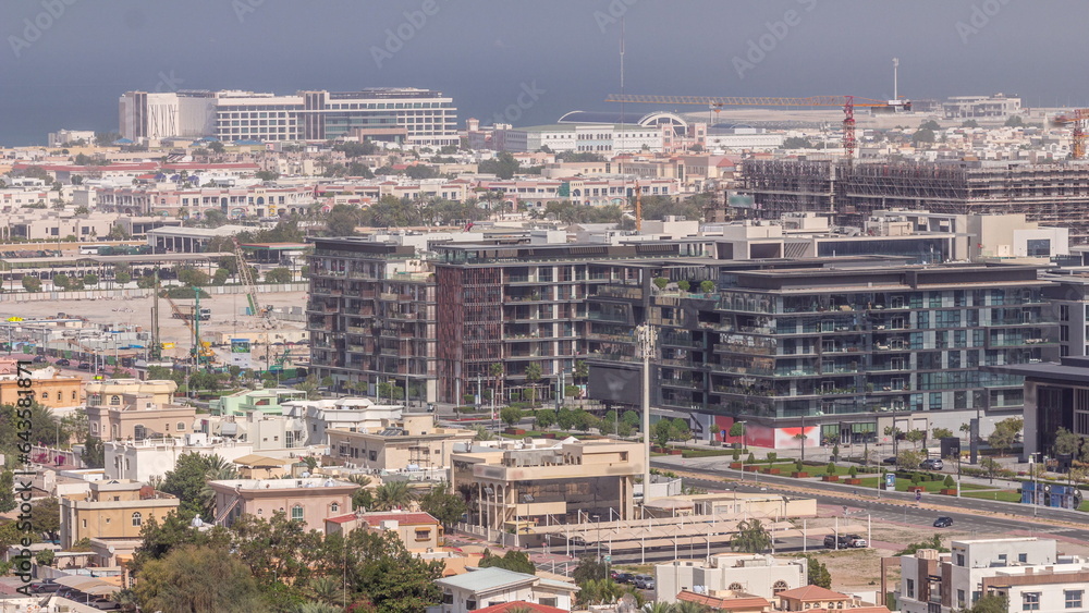 Aerial view to Dubai City Walk district timelapse from above