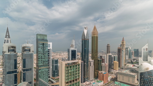 Skyline panoramic view of the high-rise buildings on Sheikh Zayed Road in Dubai aerial timelapse, UAE.