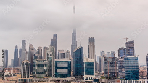Aerial view to Dubai Business Bay and Downtown with the various skyscrapers and towers timelapse