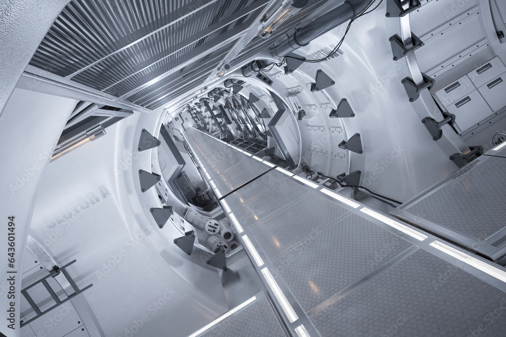 Long, bright, oval, empty science-fiction spaceship corridor in a cosmic station