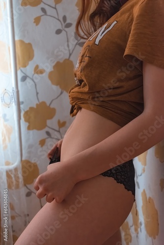 beautiful young woman in black lace panties