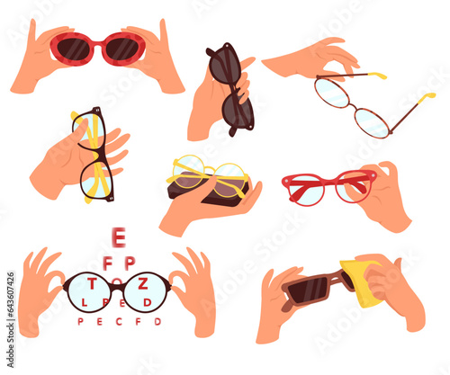 Human hand holding eyewear glasses protecting from sun and for eyesight vision correction set