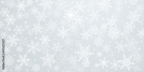 Christmas background of beautiful complex snowflakes in white colors. Winter illustration with falling snow