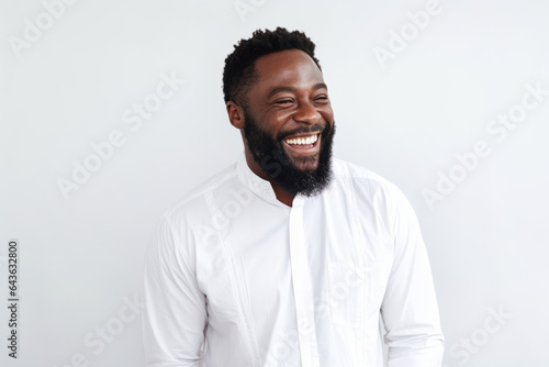 Masculine Beauty: Smiling Man in Studio Portrait in white concept © GustavsMD