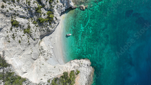 Obraz na plátně Aerial drone photo of secluded paradise exotic island white beach with crystal c