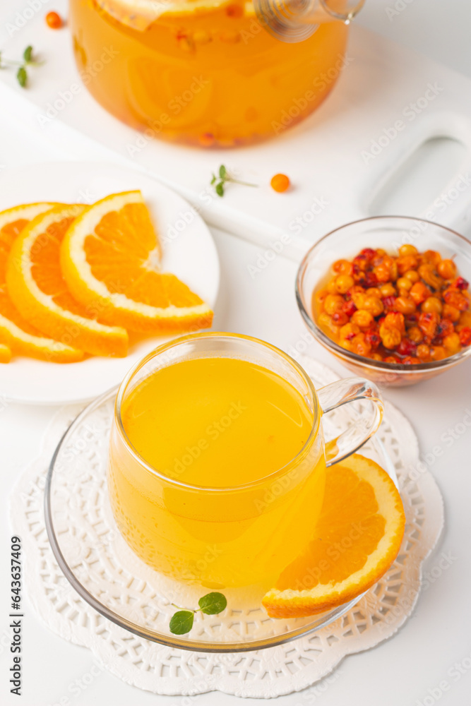 Sea buckthorn tea drink with oranges and mint. Autumn comfort hot drink. Herbal vitamin tea. Sea buckthorn tea drink with oranges and mint. Autumn comfort hot drink. Herbal vitamin tea.