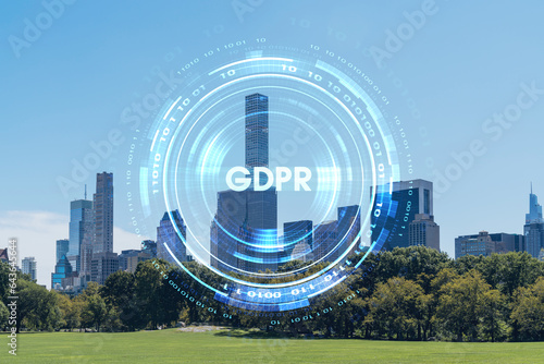 Green lawn at Central Park and Midtown Manhattan skyline skyscrapers at day time, New York City, USA. GDPR hologram, concept of data protection, regulation and privacy for all individuals