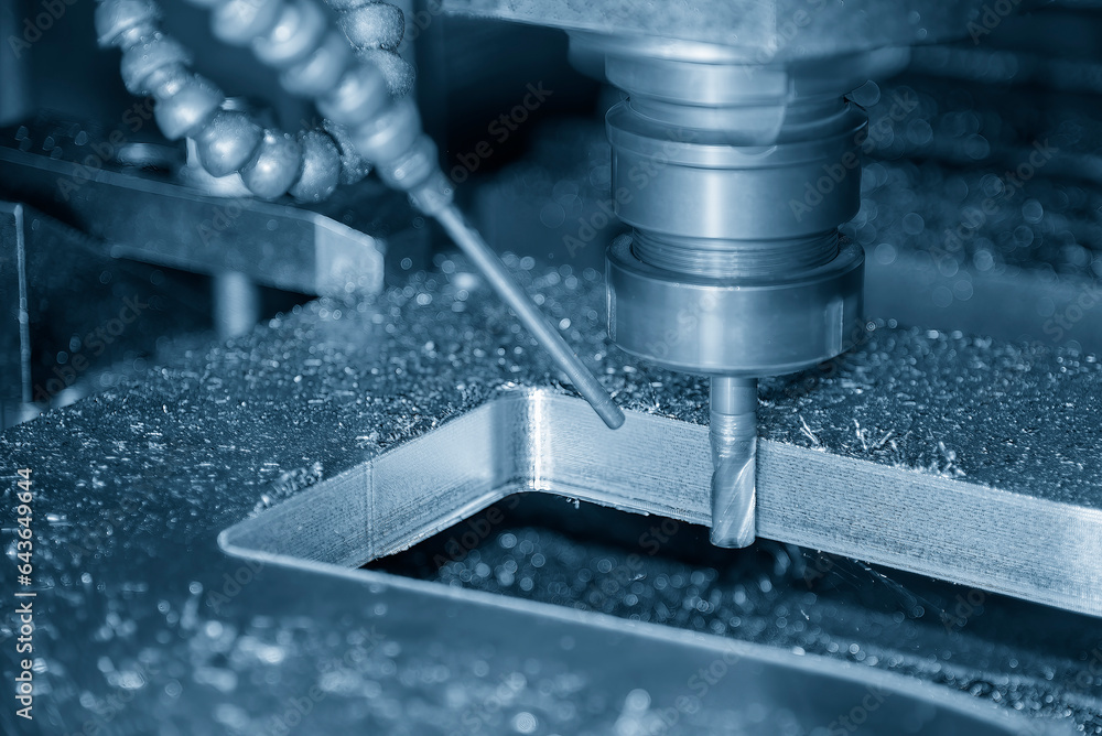 © Pixel_B - The CNC milling machine cutting injection mold part by solid ball end mill tool in the light blue scene. © Pixel_B - The CNC milling machine cutting injection mold part by solid ball end mill tool in the light blue scene.