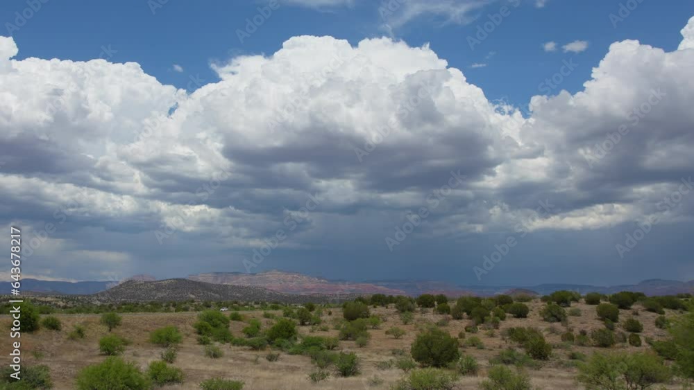 Churning Cumulus Clouds over Desert Landscape Timelapse Churning Cumulus Clouds over Desert Landscape Timelapse